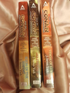 Three hardcover books from the Ace Fantasy series by J. Steven York, titled 'The Serpent', 'Heretic of Sin', and 'Venom of Luxury', displayed side-by-side on a draped satin fabric background.