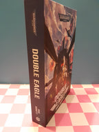 Book titled 'Double Eagle' by Dan Abnett on a checkered surface