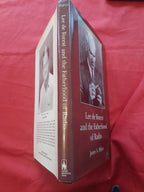Book titled 'Lee de Forest and the Fatherhood of Radio' on a red background