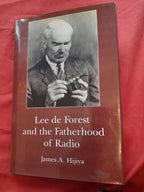 Book cover of 'Lee de Forest and the Fatherhood of Radio' with a black and white photo of a man on a red background.
