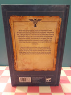 Back cover of a book with text and logos on a checkered floor background